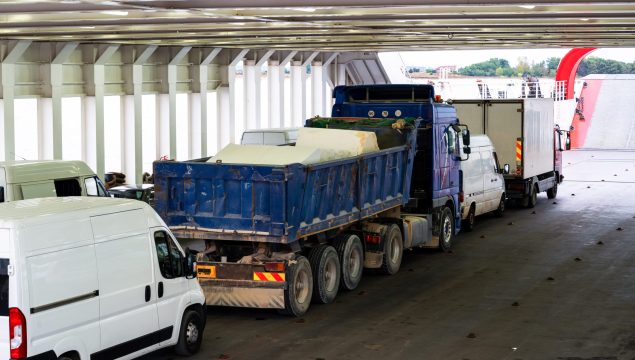 Trucks and minibuses located inside the ferryboat, Greece